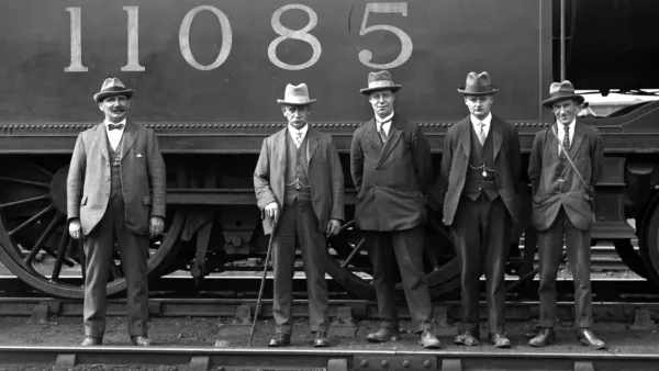 FR 4-4-2T LMS No 11085 with posed visiting enthusiasts